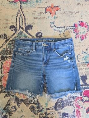 American Eagle Outfitters High-Rise Distressed Denim Shorts - Blue Wash